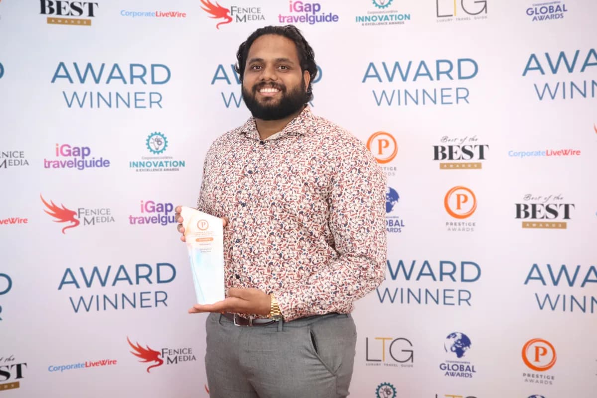 Jhonty Barreto, founder of SEO Engico, holding the SEO Agency of the Year trophy